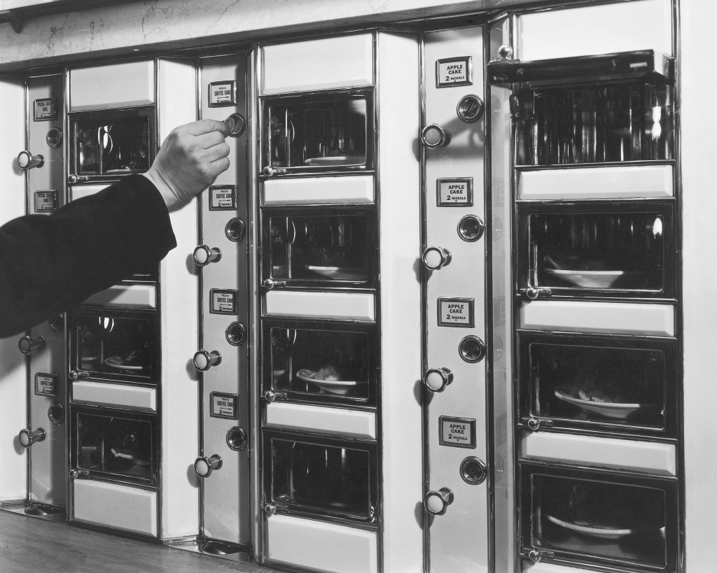 Back in the day, coins were used on the machines; the newfangled automat would rely on the tap of a credit card.