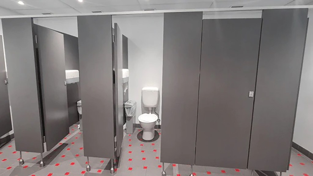 Diagram of a bathroom layout with three cubicles labelled A, B, and C, posted by a user on Mumsnet sparking online debate on toilet etiquette