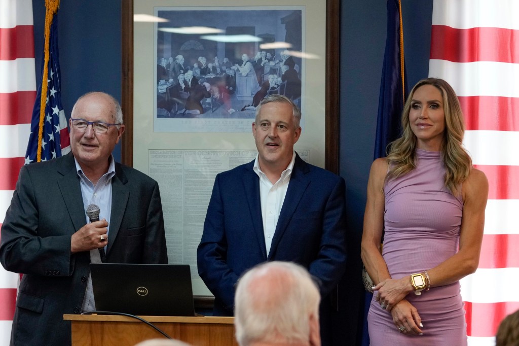 Michigan Republican Party Chairman Pete Hoekstra, left, Republican National Committee Co-chair Michael Whatley and Co-chair Lara Trump take questions at the Oakland County GOP Headquarters, Friday, June 14, 2024 in Bloomfield Hills, Michigan