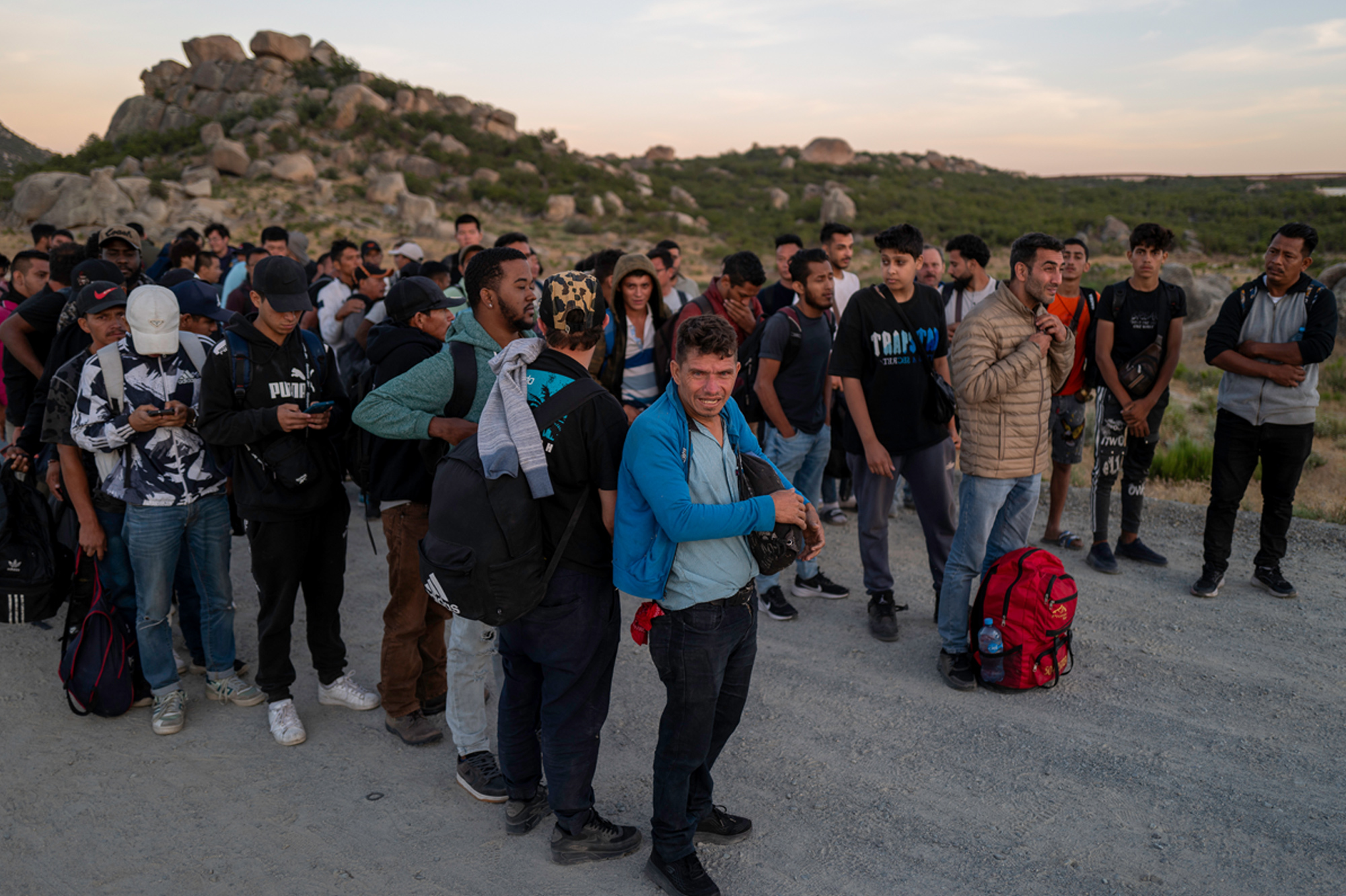 Hundreds of migrants pour across US southern border despite Biden’s ‘crackdown’