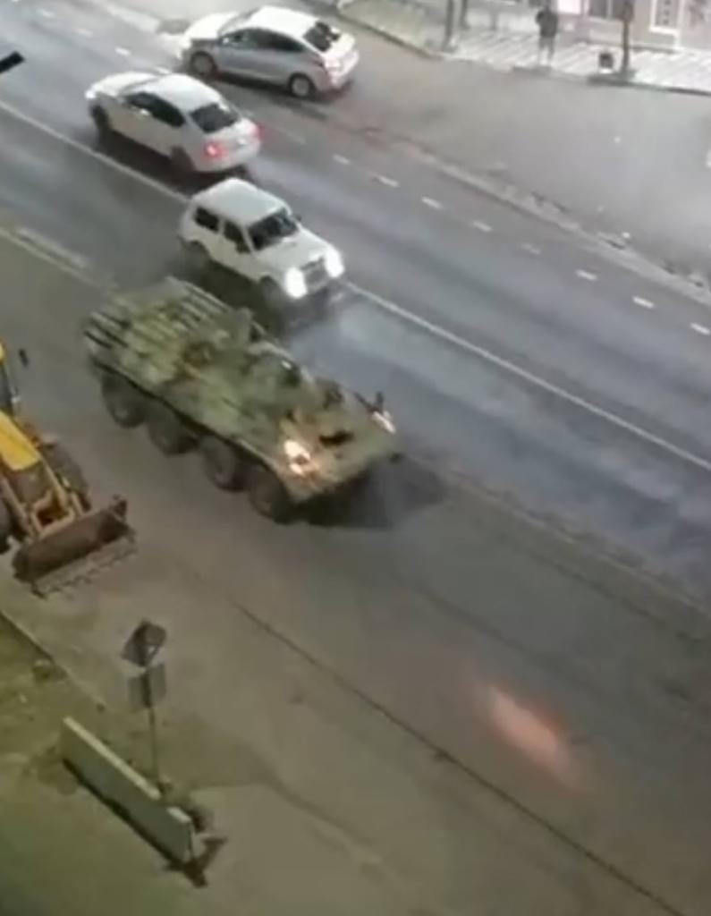 An armored military vehicle rushes to respond to the suspected terror attacks in Derbent.