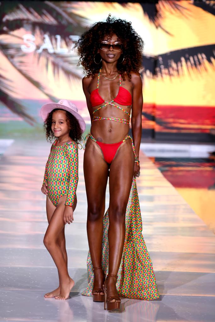 Models showcasing swimsuits for SALPICA on the runway during Miami Swim Week at SLS South Beach, Miami Beach, Florida.