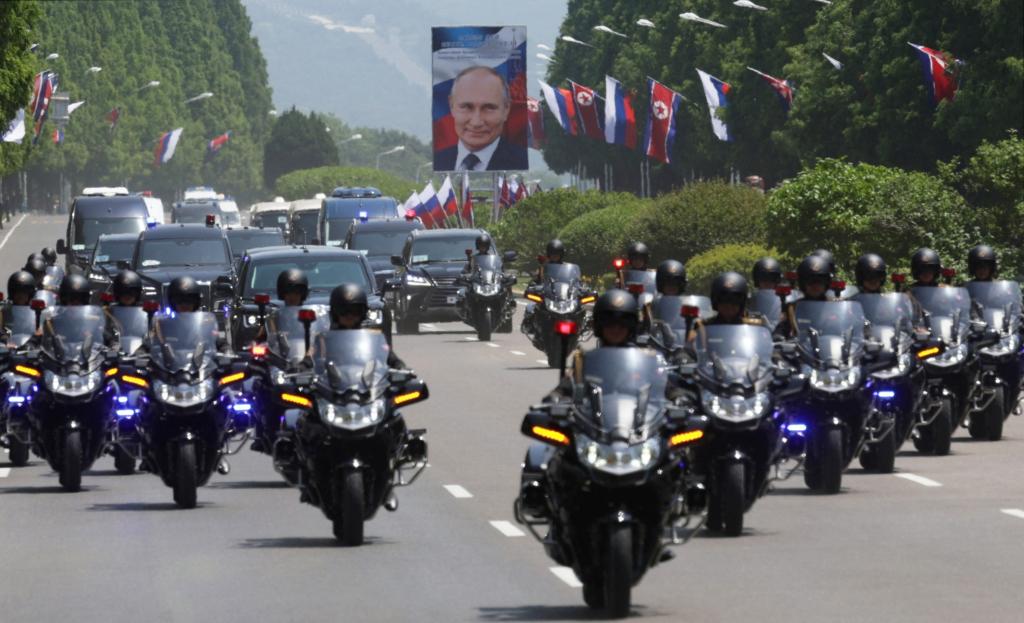Huge crowds lined up on the streets to greet Putin’s motorcade, chanting “Welcome Putin” and waving flowers and North Korean and Russian flags.