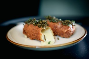 mozzarella sticks with caviar on top. Chelsea Living Room