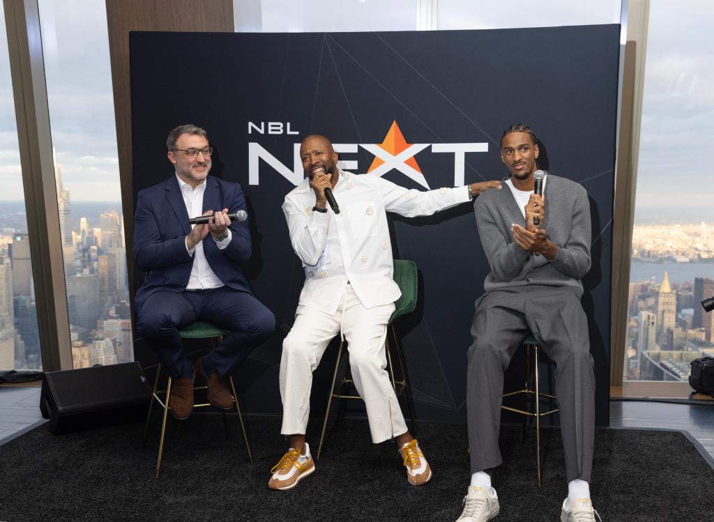 Kenny Smith (c.), the NBL Director of Player Initiatives, and French teenager Alex Sarr (r.), a projected top-three pick in the 2024 NBA Draft who played for the NBL's Perth Wildcats last season, speak during the NBL Next Stars event at Peak Event Space at EDGE in Hudson Yards on Monday.