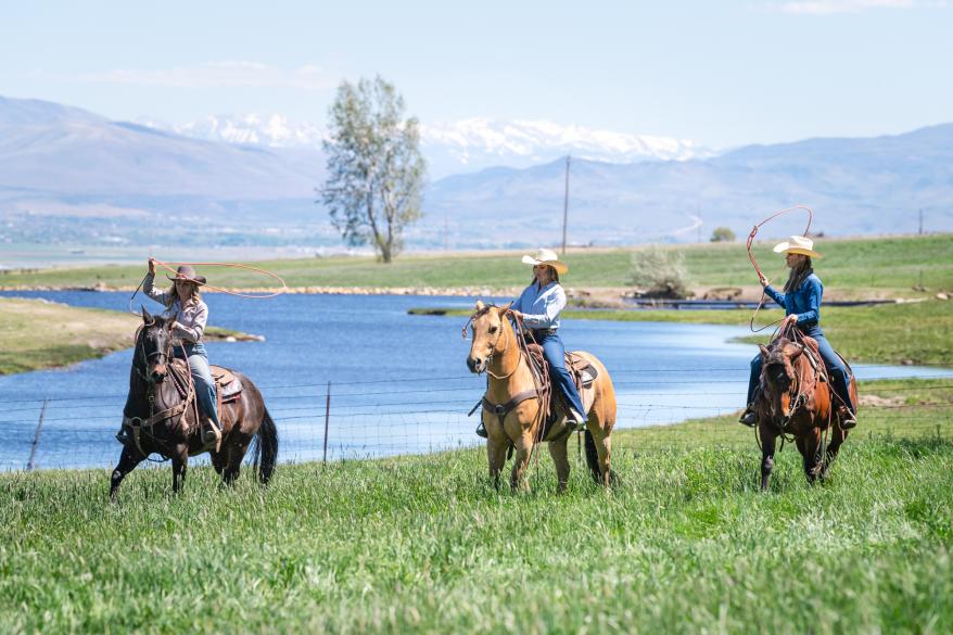 People horseback riding.