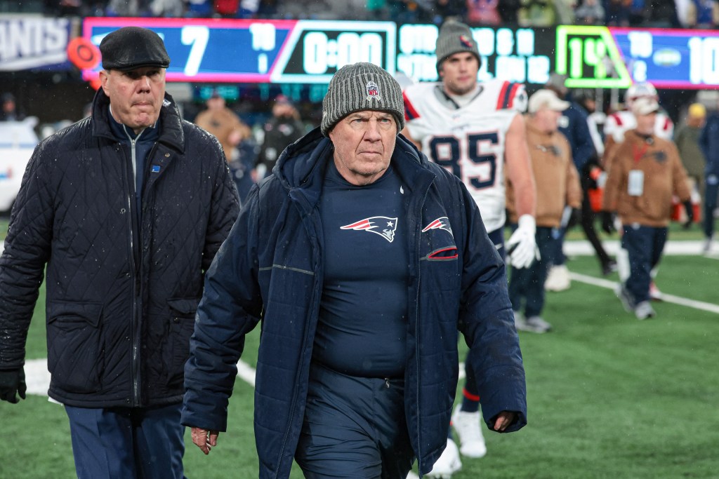 Patriots head coach Bill Belichick walks off the field after the game against the New York Giants at MetLife Stadium on November 26, 2023. 