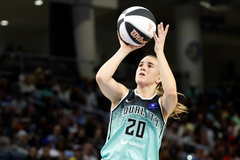Liberty guard Sabrina Ionescu (20) shoots against the Chicago Sky during the first half on Tuesday.