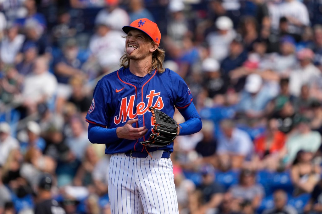 New York Mets pitcher Phil Bickford pausing on the mound during a spring training baseball game against the New York Yankees
