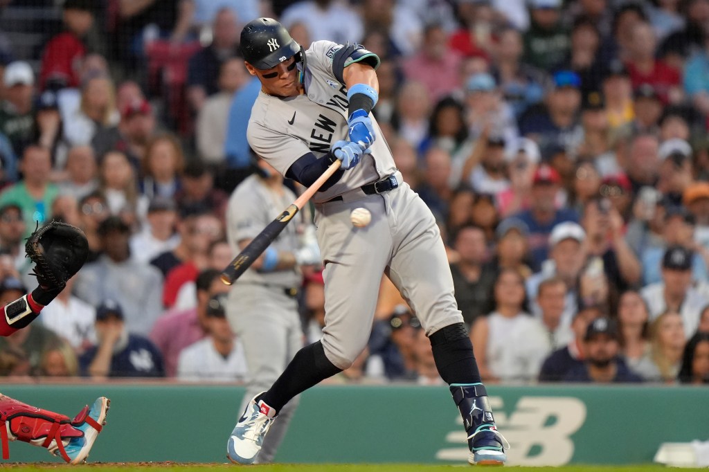 New York Yankees' Aaron Judge strikes out swinging in the fourth inning of a baseball game against the Boston Red Sox, Sunday, June 16, 2024, in Boston. 