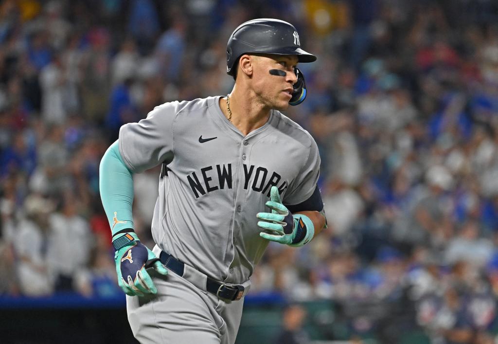 ankees center fielder Aaron Judge (99) rounds the bases after hitting a two-run home run in the seventh inning against the Kansas City Royals