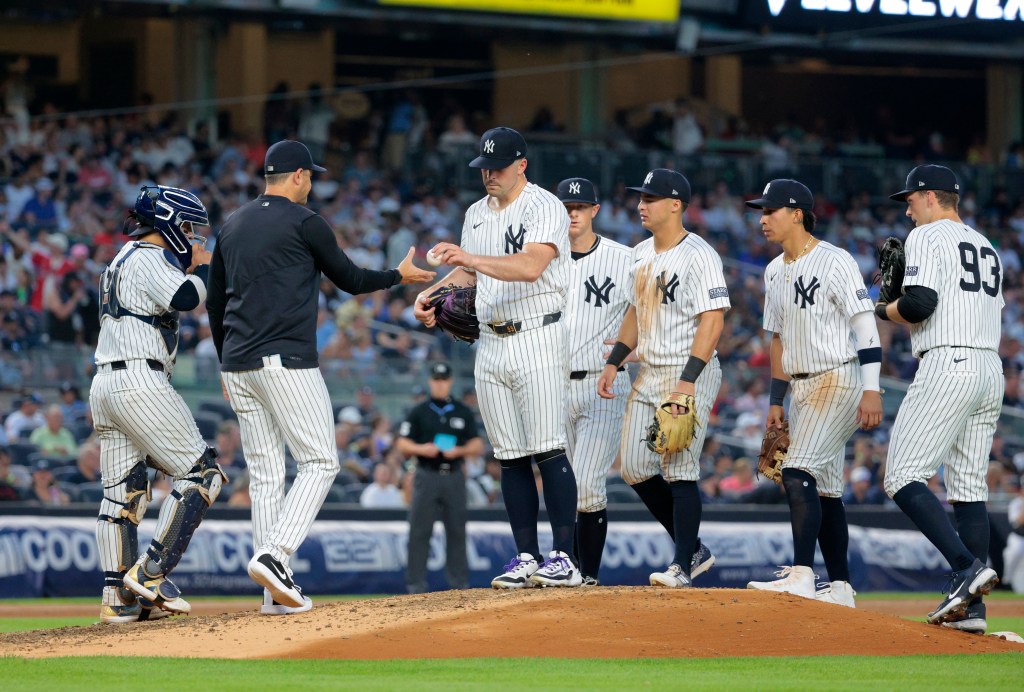 ankees manager Aaron Boone #17, removes New York Yankees pitcher Carlos RodÃ³n #55, from the game in the 4th inning