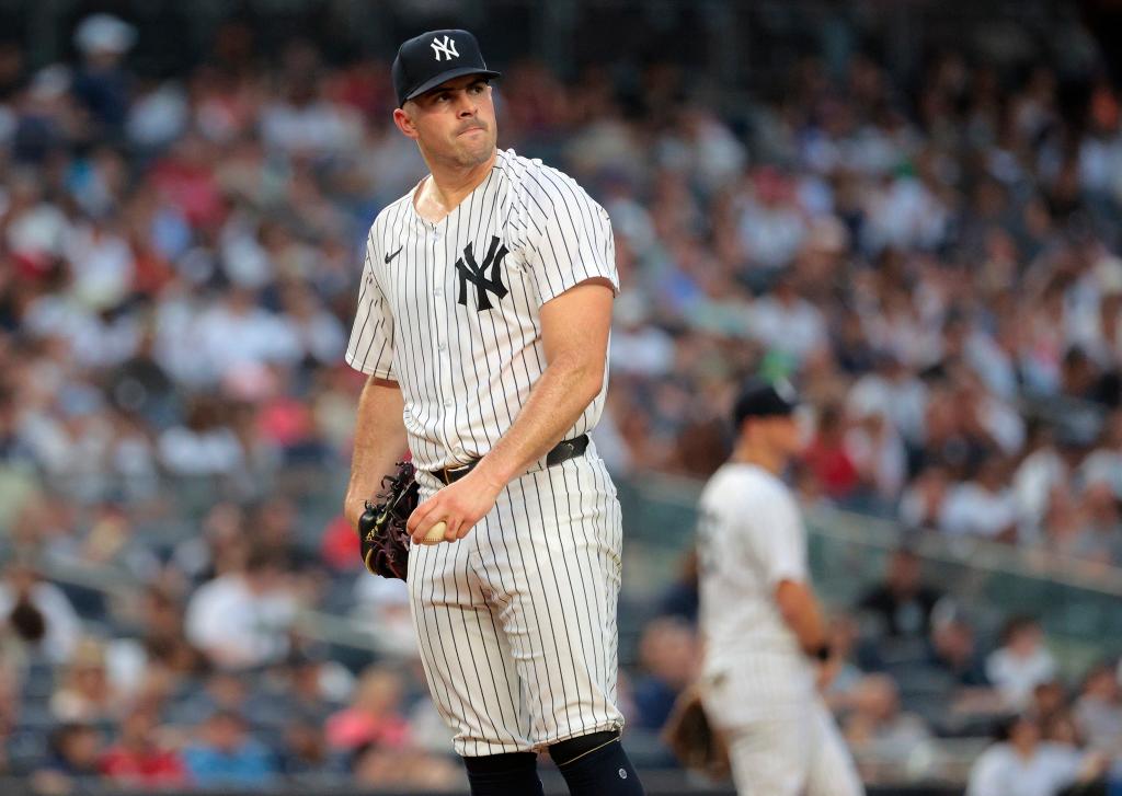 New York Yankees pitcher Carlos Rodón #55, reacts after giving up a run in the 3rd inning.