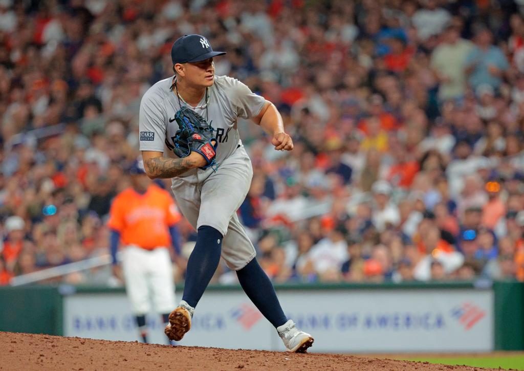 New York Yankees pitcher Victor Gonzalez throwing a pitch during the 7th inning at Minute Maid Park