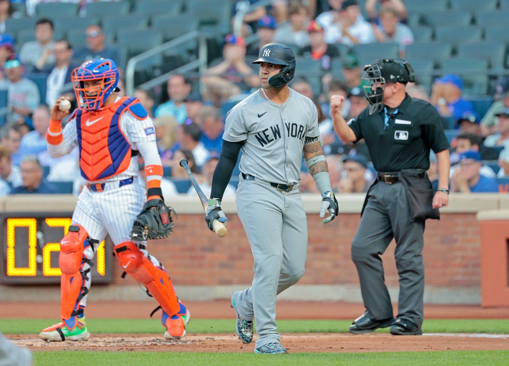 Gleyber Torres walks back to the dugout after striking out on Tuesday.