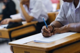 New York high school students would no longer need to pass five Regent exams to graduate under a new plan from the State Education Department.