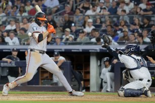 Gunnar Henderson is hit by a pitch by Victor Gonzalez during the seventh inning of the Yankees' 7-6, 10-inning loss to the Orioles.