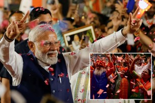 Indian Prime Minister Narendra Modi gestures as he arrives at Bharatiya Janata Party (BJP) headquarters in New Delhi, India, June 4, 2024.