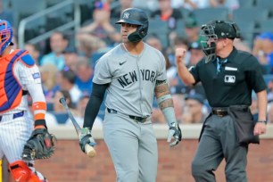 Yankees' Gleyber Torres huddles with Aaron Boone after brutal outing