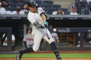 Giancarlo Stanton, who doubled and then scored in the fourth inning, exited the game early when he was pinch-hit for with Trent Grisham during the sixth inning of the Yankees' game vs. the Braves.