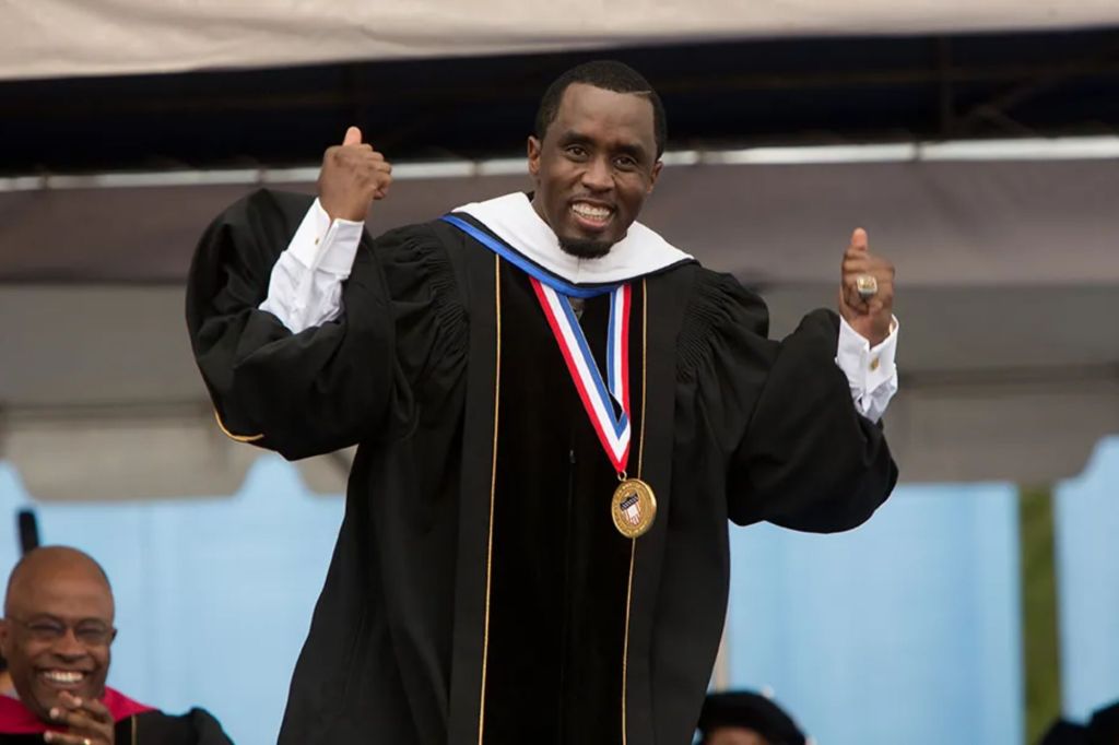 WASHINGTON, DC - MAY 10: Entrepreneur and philanthropist Sean "Diddy" Combs reacts after delivering the commencement speech at Howard University's 146th commencement exercises on May 10, 2014 in Washington, D.C. Also honored at the convocation were CNN anchor Wolf Blitzer, Chairman and CEO of PespiCo Indra K. Nooyi, professor of surgery Dr. Clive Callender, and jazz legend Benny Golson. (Photo by Allison Shelley/Getty Images for DKC)