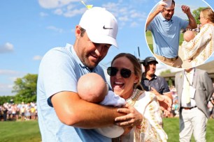 Scottie Scheffler of the United States celebrates with wife Meredith and son Bennett after winning the Memorial Tournament on Sunday.