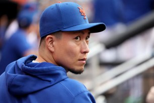 Kodai Senga, who threw a 30-pitch bullpen session, looks on from the dugout before the Mets' 10-4 win over the Marlins.