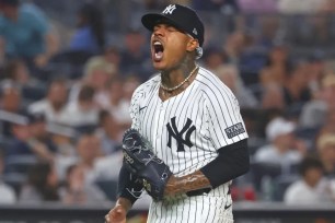Marcus Stroman lets out a yell after giving up a homer in the seventh inning, but his strong outing was more than enough in the Yankees' 8-3 win over the Braves.