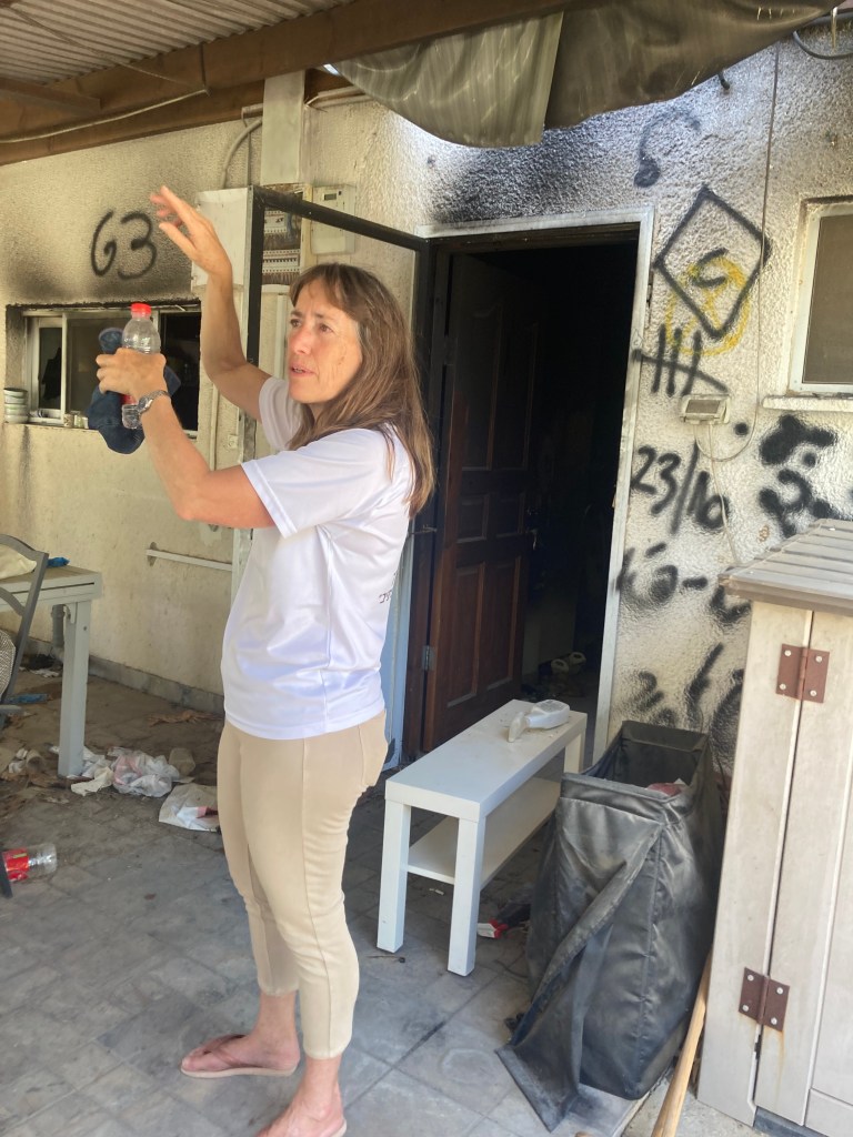 Irit Lahav gives a tour of the remains of the Nir Oz kibbutz.