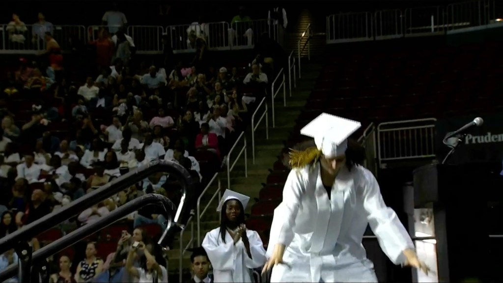 Paramus Catholic High School flipping over into a handstand. 