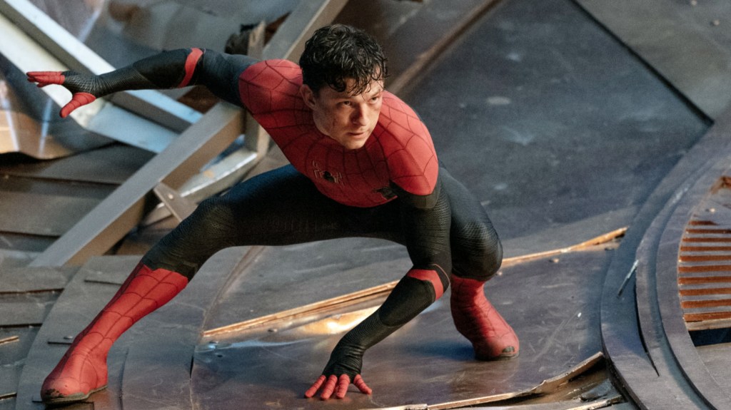 Tom Holland in costume as Spider-Man