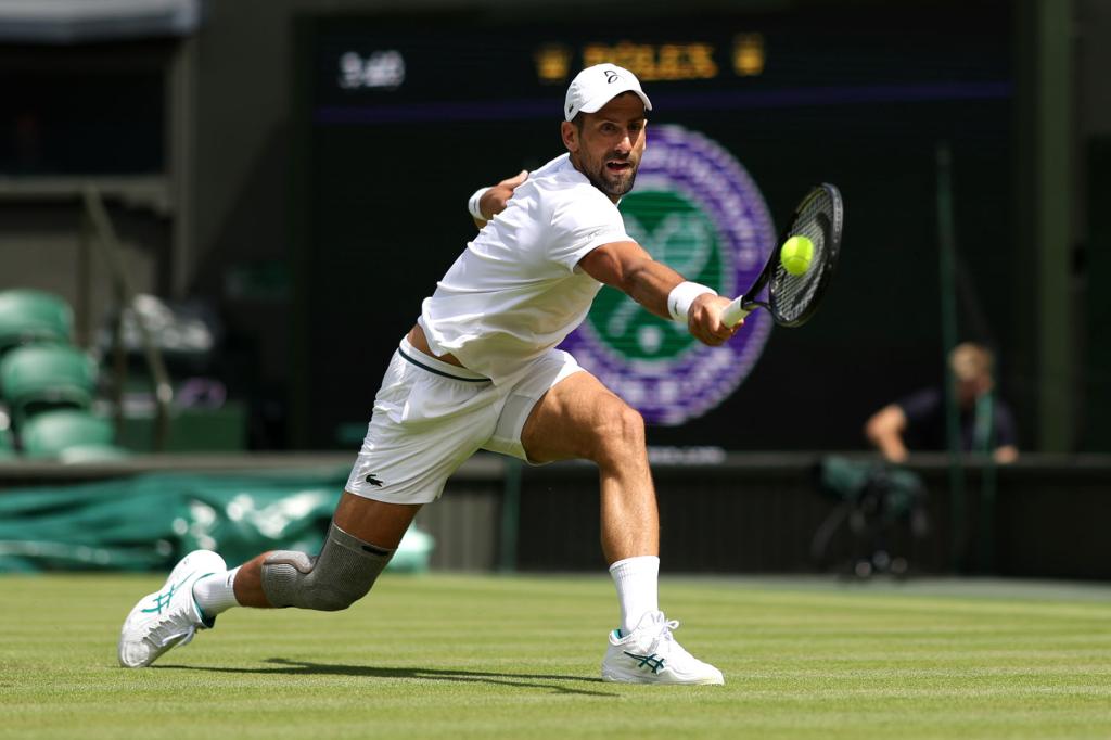 Novak Djokovic of Serbia plays a backhand during practice on centre court prior to The Championships Wimbledon 2024 at All England Lawn Tennis and Croquet Club on June 27, 2024 in London, England. 