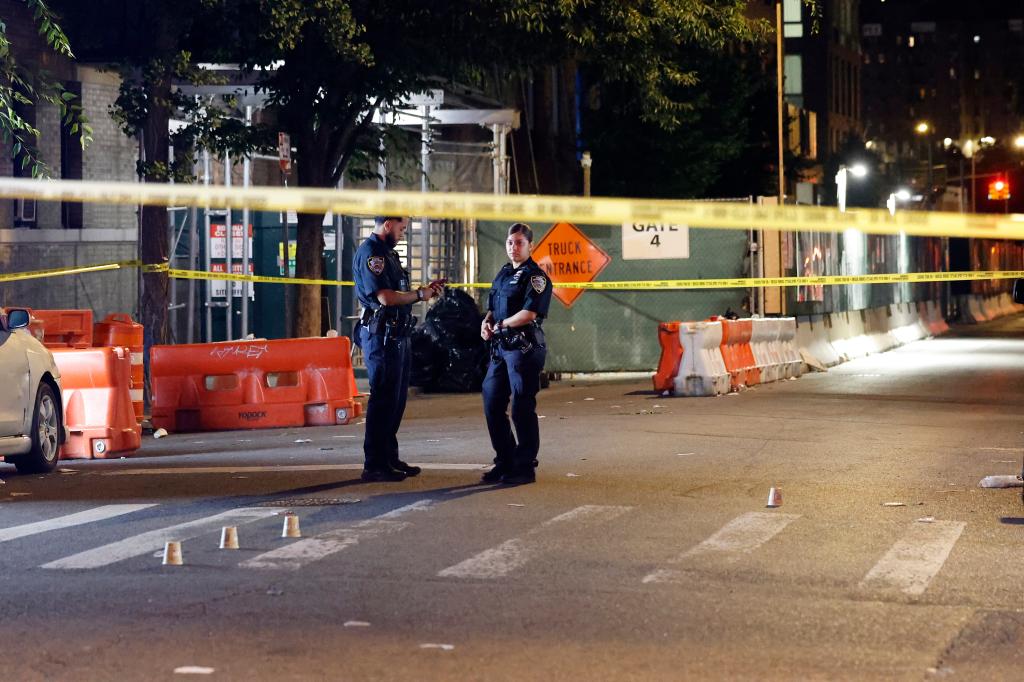 NYPD officers on the scene of a multiple shooting at West 270 Street and 10 Avenue in Inwood, NJ