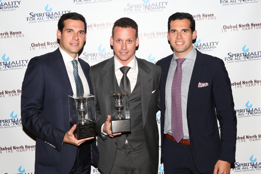 Oren, Tal and Alon Alexander at a 2014 gala in New York City. 