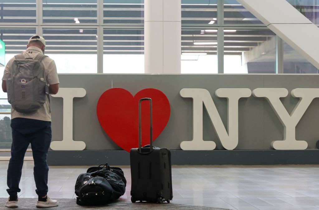 A passenger is pictured at LaGuardia Airport in Queens.