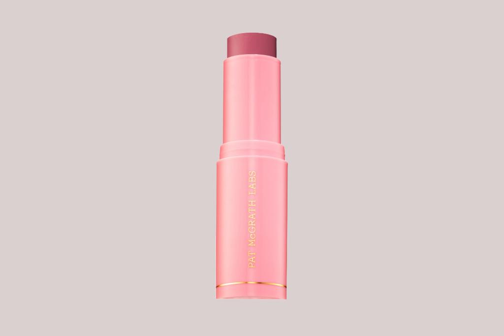 A pink lipstick with gold lettering by Pat McGrath