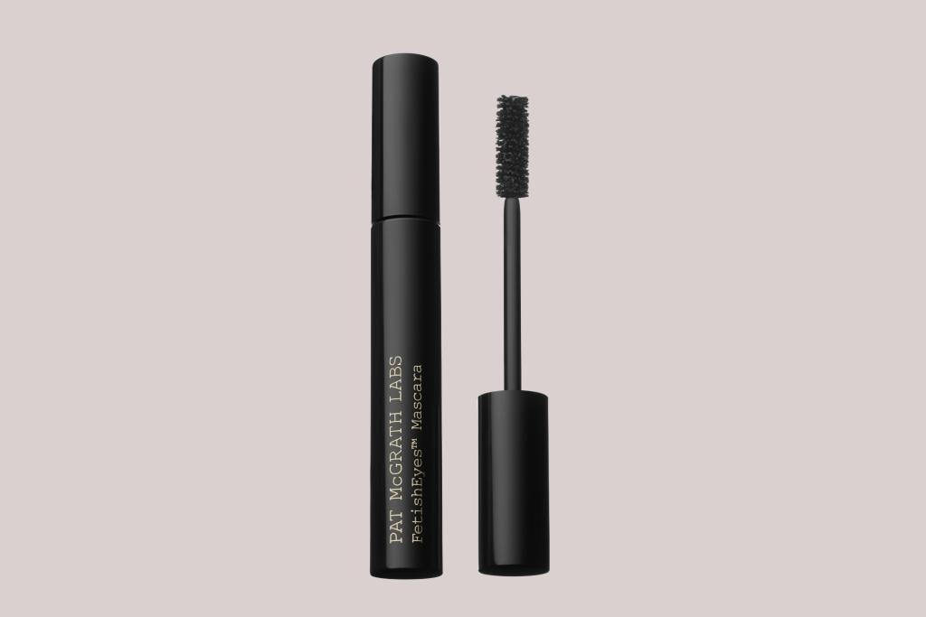 Black tube of Pat McGrath mascara with matching brush