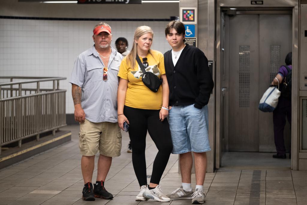 Amber Hughes (center) with her son, Josh Genera (right) and her husband, Justin Hughes (left) said the man got dragged along the platform, but miraculously survived. 