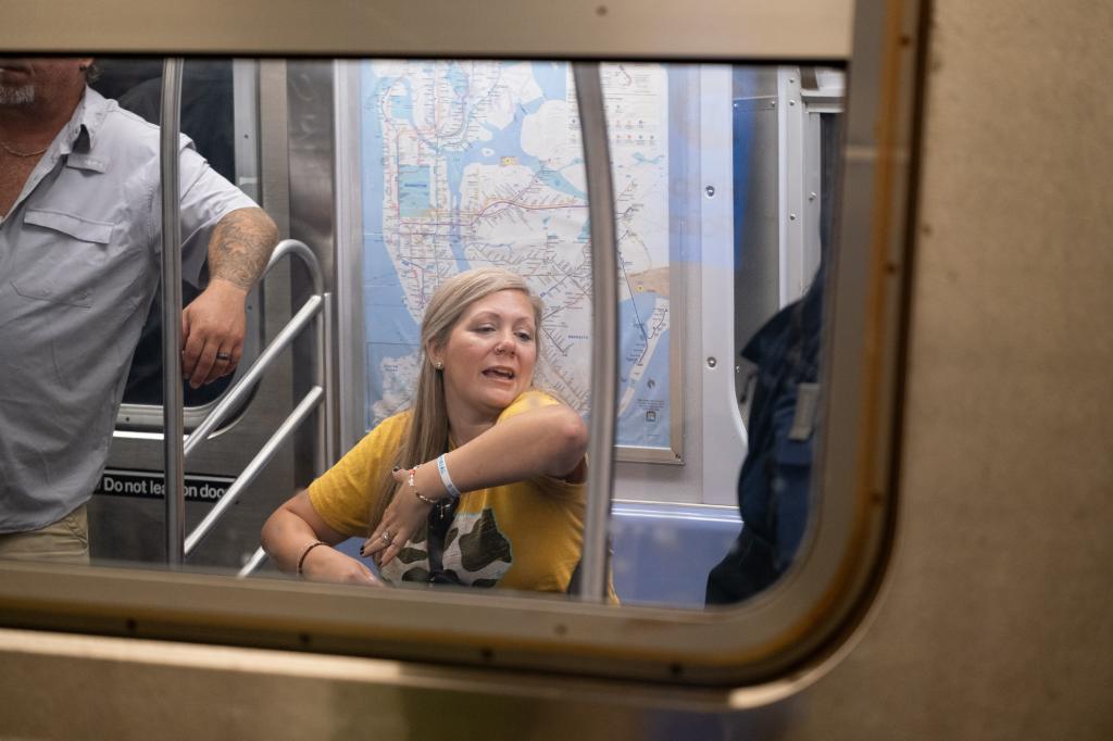 Amber Hughes, a bartender from Georgia, on the subway. 