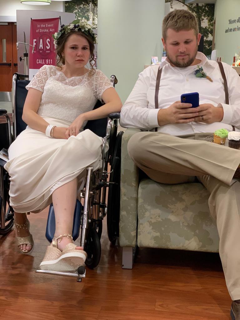 Mary Greenwell, 27, from Boston, Kentucky with husband Blake, 30, after breaking her ankle on her October 2019 wedding day. 