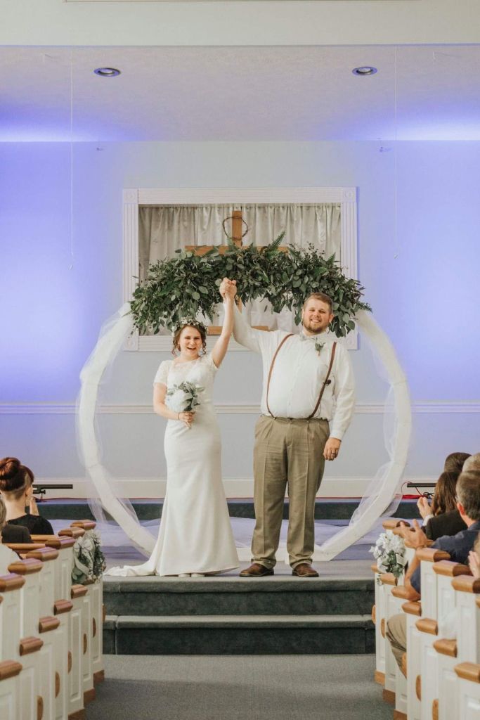 Mary Greenwell, 27, from Boston, Kentucky, at the altar before breaking ankle on her October 2019 wedding day. 