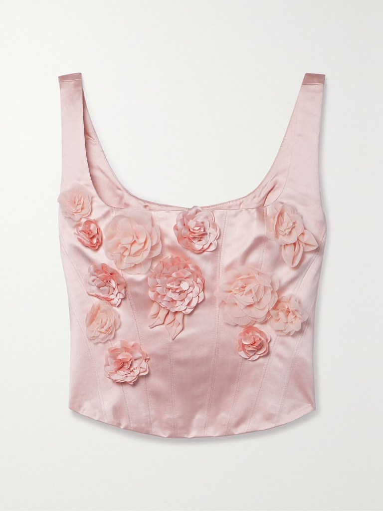 Pink satin bustier top with floral appliqué by LOVESHACKFANCY, styled as inspired by Bridgerton's Sharma Chic Corsette