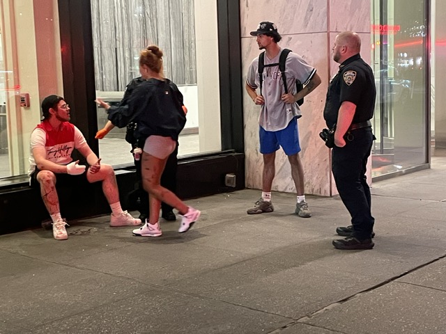 A 23-year-old man was slashed on two of his fingers and tased in the chest during a brawl with three strangers on Sixth Avenue near West 47th Street, police said. 
