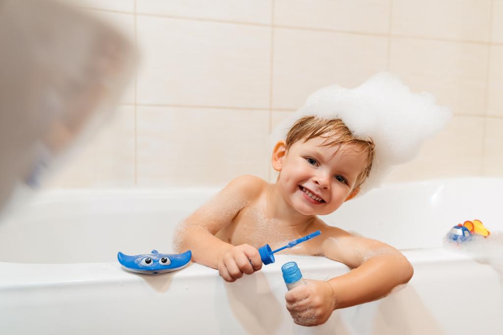 A boy in a tub. 