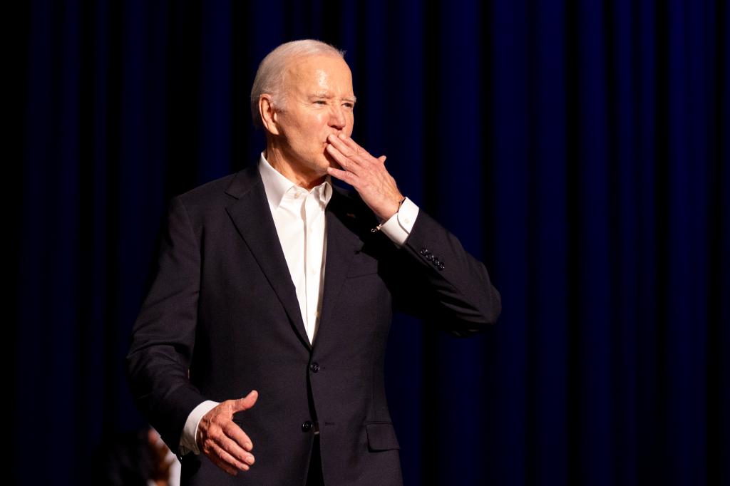 President Joe Biden blows a kiss as he arrives for a campaign event with former President Barack Obama moderated by Jimmy Kimmel at the Peacock Theater, Saturday, June 15, 2024, in Los Angeles. 