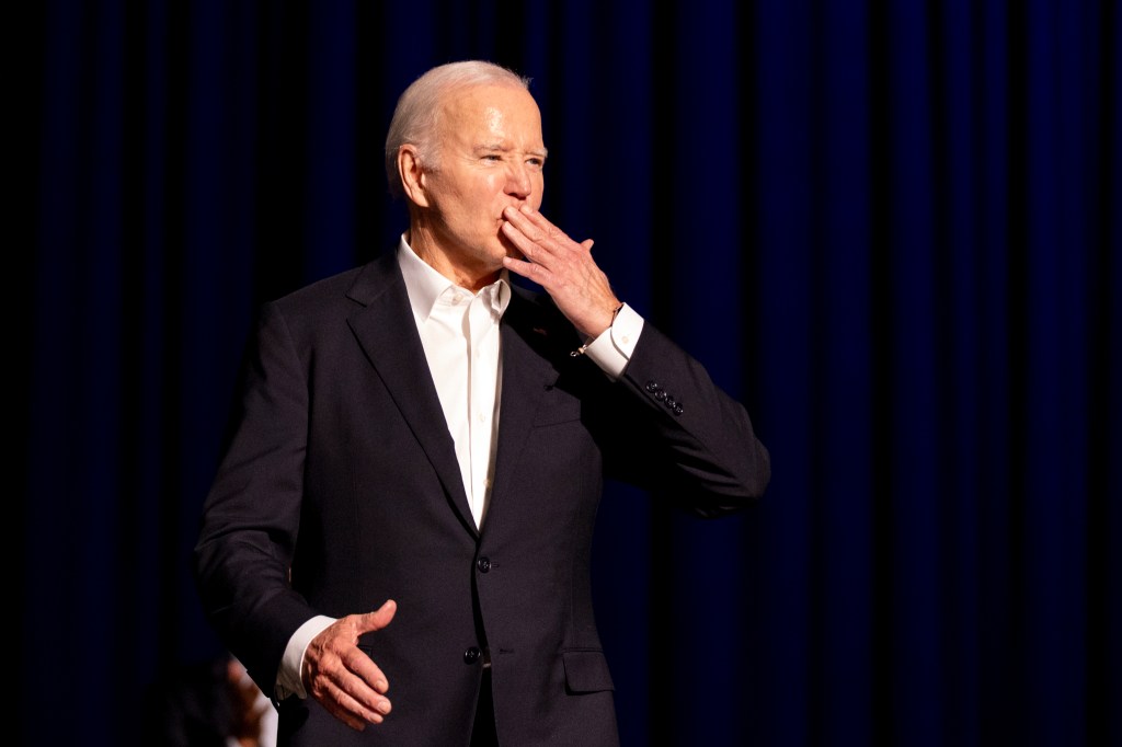 President Joe Biden blows a kiss as he arrives for a campaign event with former President Barack Obama moderated by Jimmy Kimmel at the Peacock Theater, Saturday, June 15, 2024, in Los Angeles. 