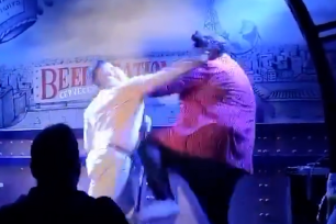 A father of a 3-month-old son sucker-punched a comedian on stage for making a vile “sexualized” joke before the show.