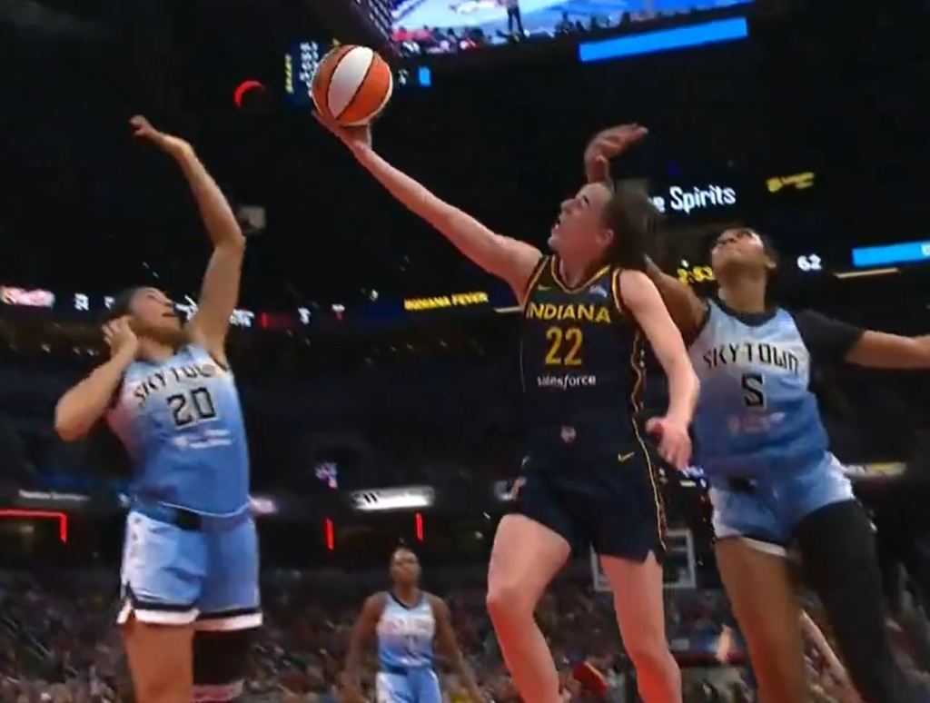 Angel Reese (5) of the Sky was called for a flagrant 1 foul for hitting the Fever's Caitlin Clark (22) in the head on a drive to the basket on Sunday in the third quarter.