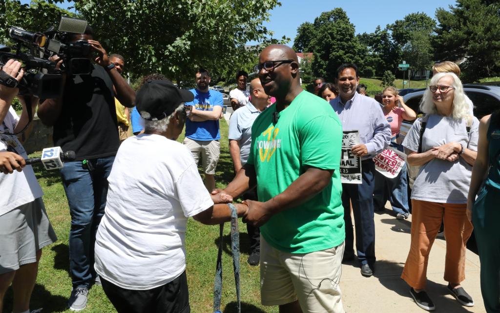 Rep. Jamaal Bowman greeting people on Westchester's first day of early voting in New Rochelle on June 15, 2024.