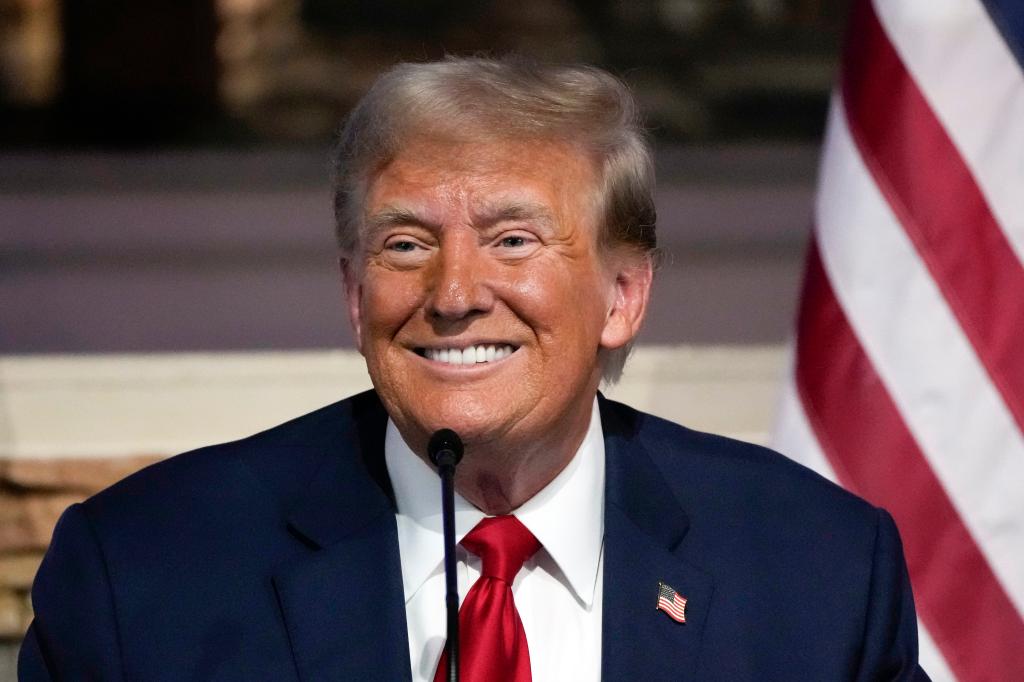 Republican presidential candidate former President Donald Trump smiles at a campaign event at 180 Church, Saturday, June 15, 2024, in Detroit.